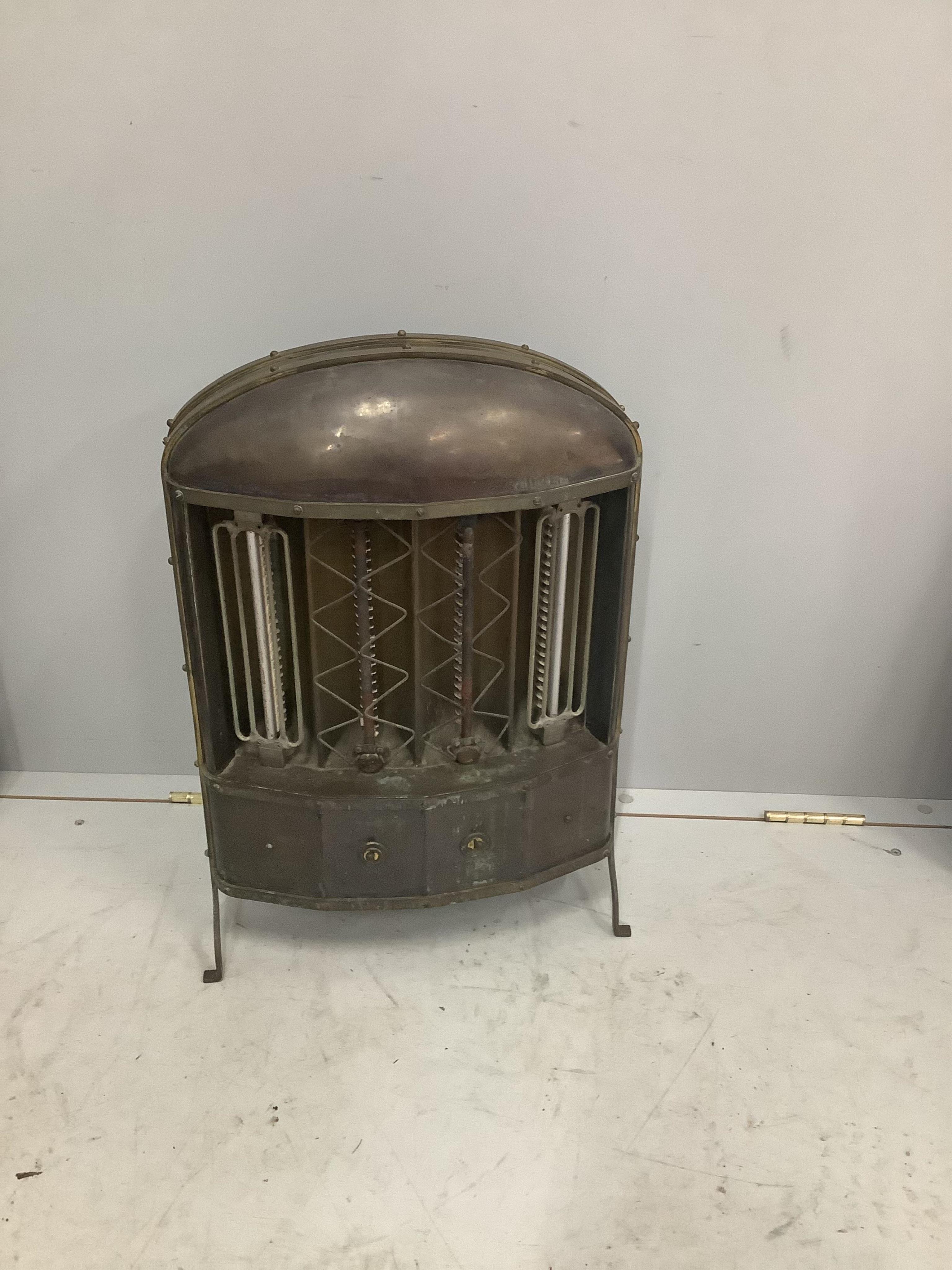 Three early 20th century French brass and copper mounted electric fires, largest width 77cm, height 73cm. Condition - fair